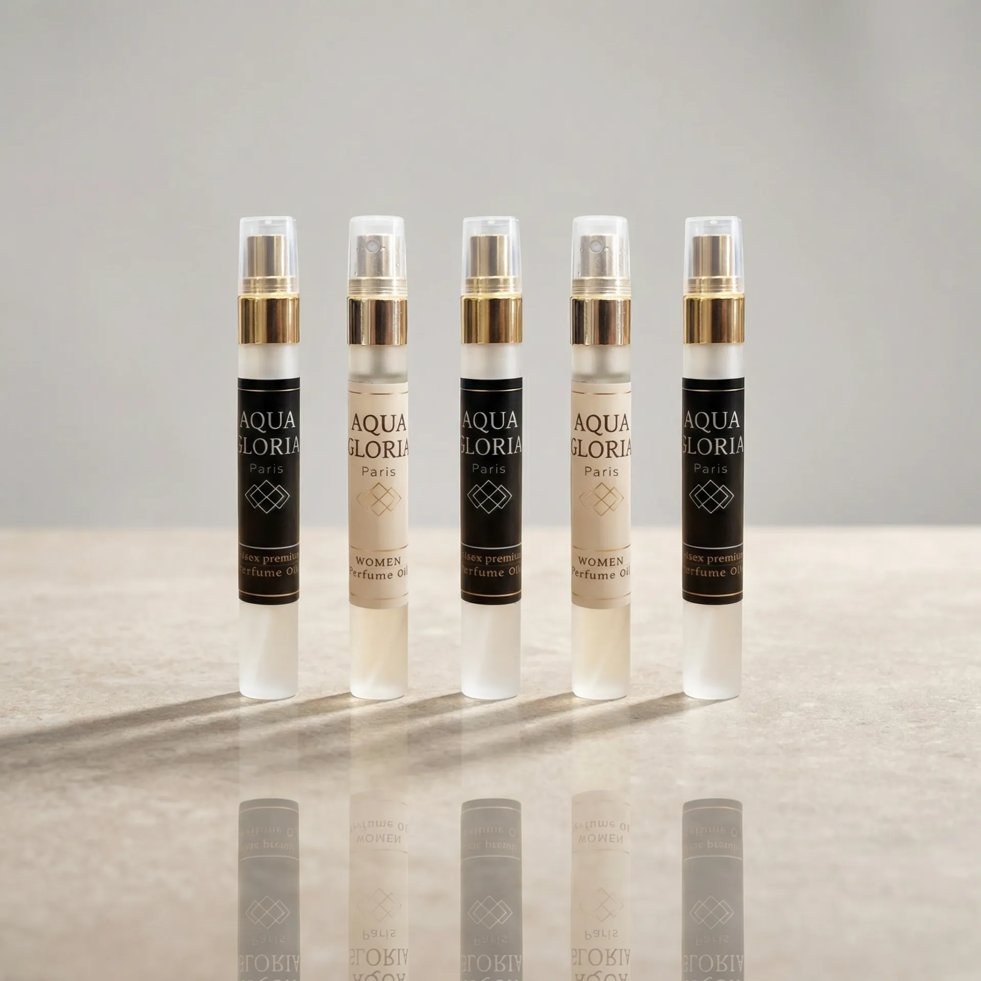 5 בשמי כיס שפריצר, כל בושם מכיל 12 מ'ל.