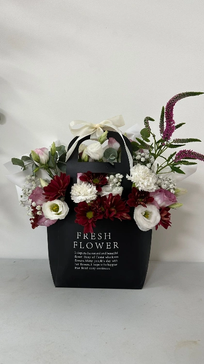 תיק פרחים לין