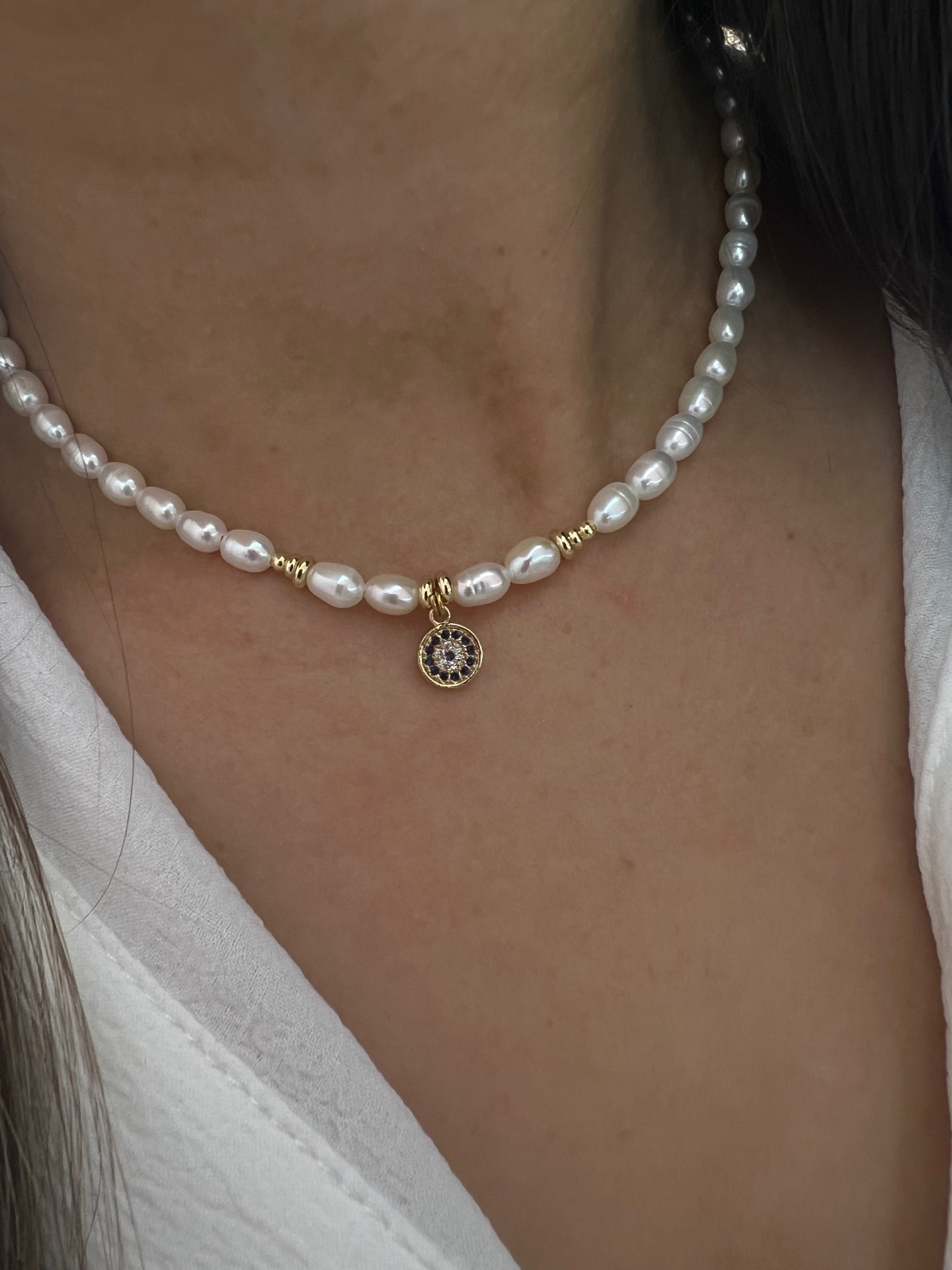 שרשרת פנינים בשילוב תליון עין 