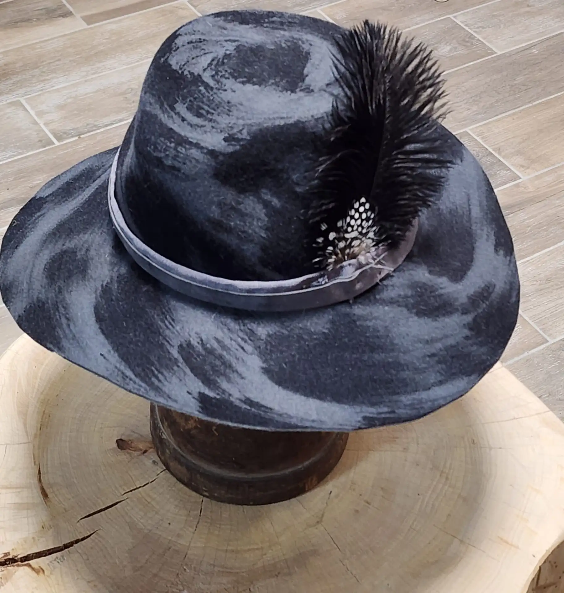 fedora style hat with fine fethers