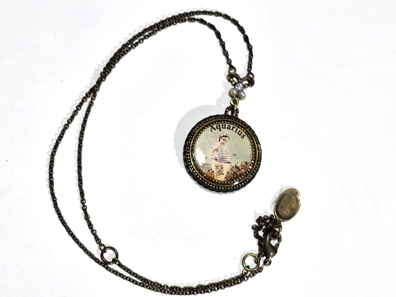 שרשרת עם תליון של מיכל נגרין קולקצית הבובות