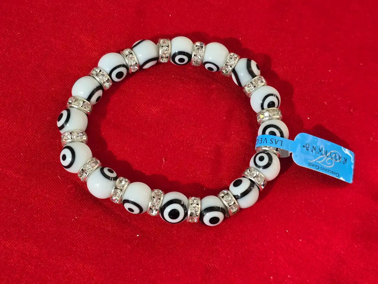צמיד עיניים! חדש! מאבני חן לבנות כדוריות הצמיד הוא צמיד עין הרע