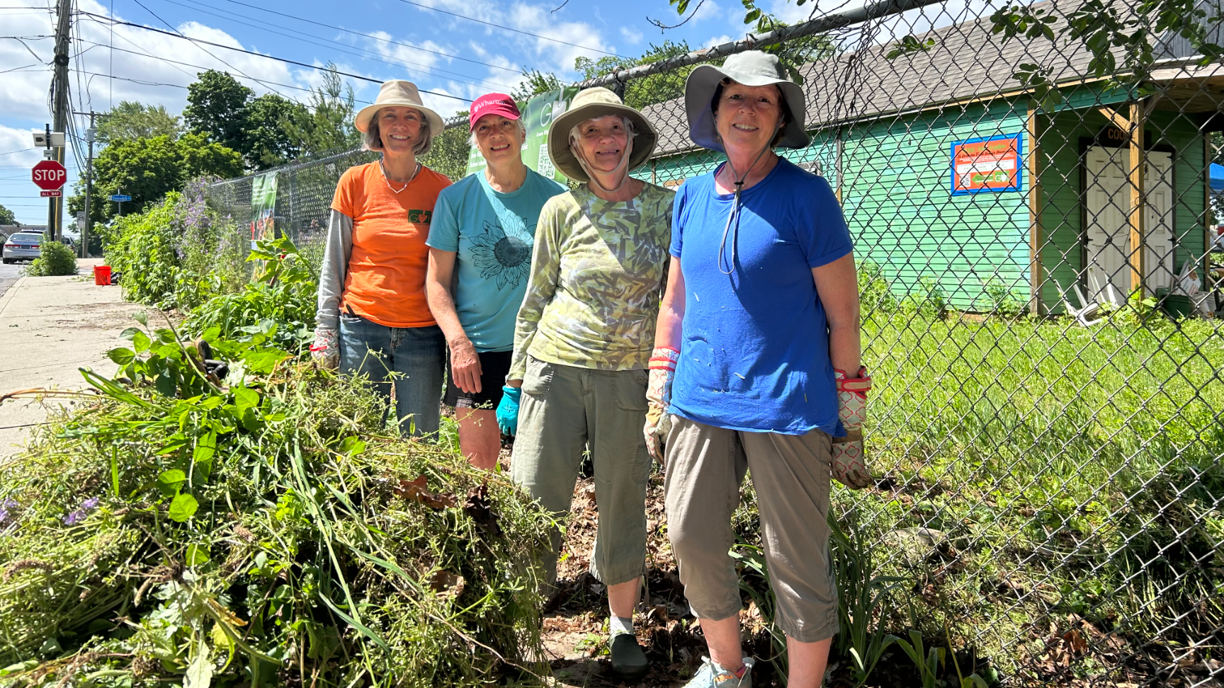 Diverse hands holding planet