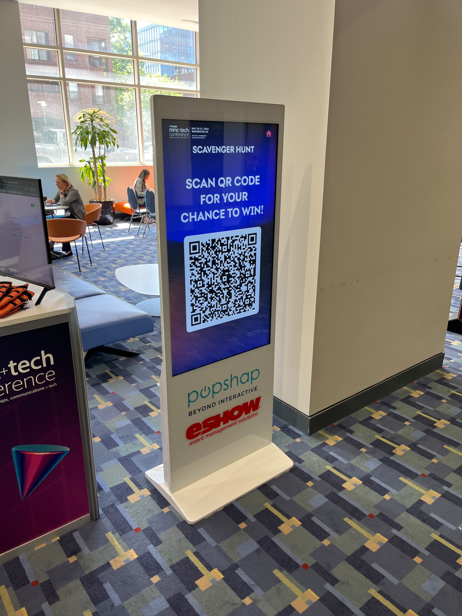 standing kiosk with QR reader