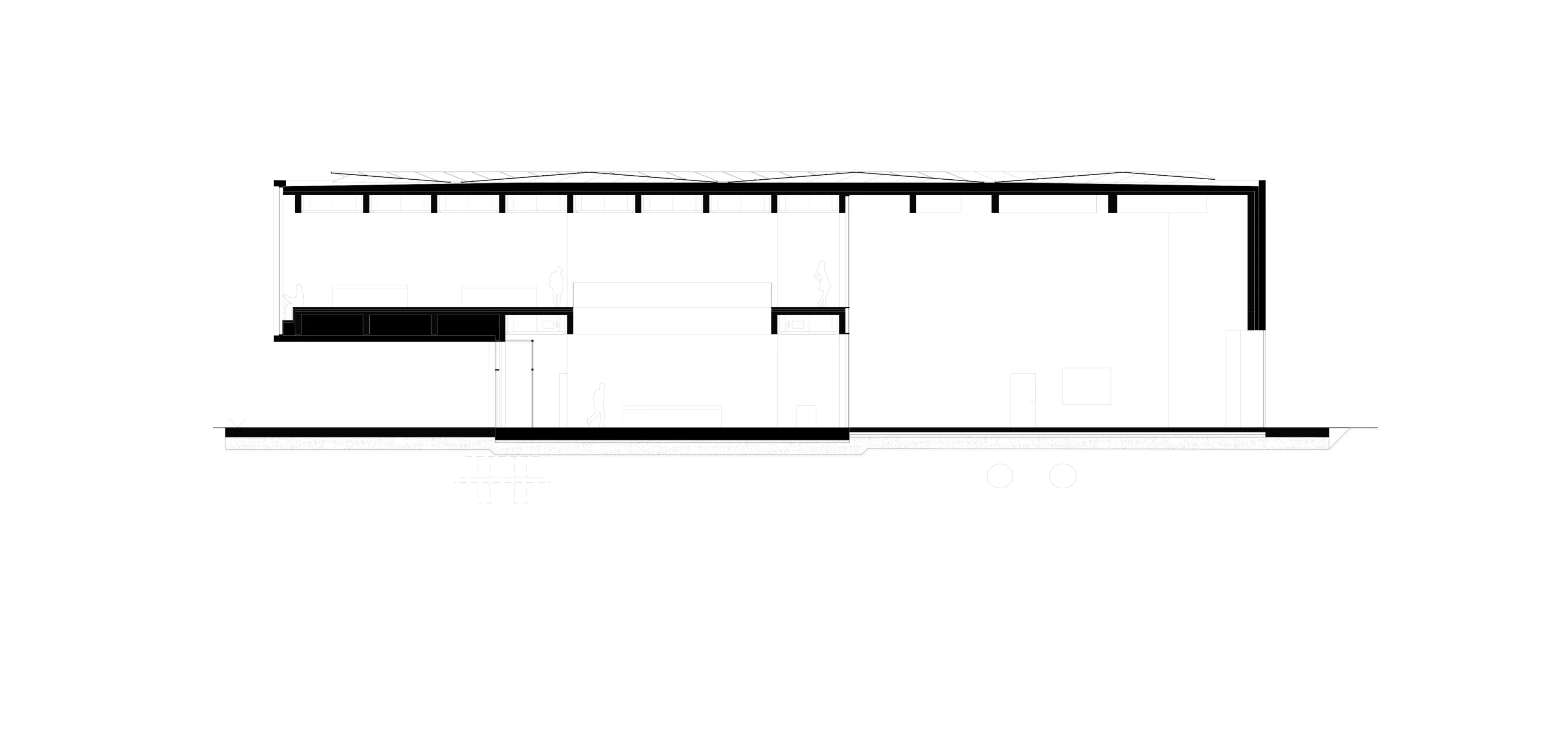 Längsschnitt: Konstruktive Schichtung von Mezzanin-Ebenen, Rippendecken und wandartigen Trägern.