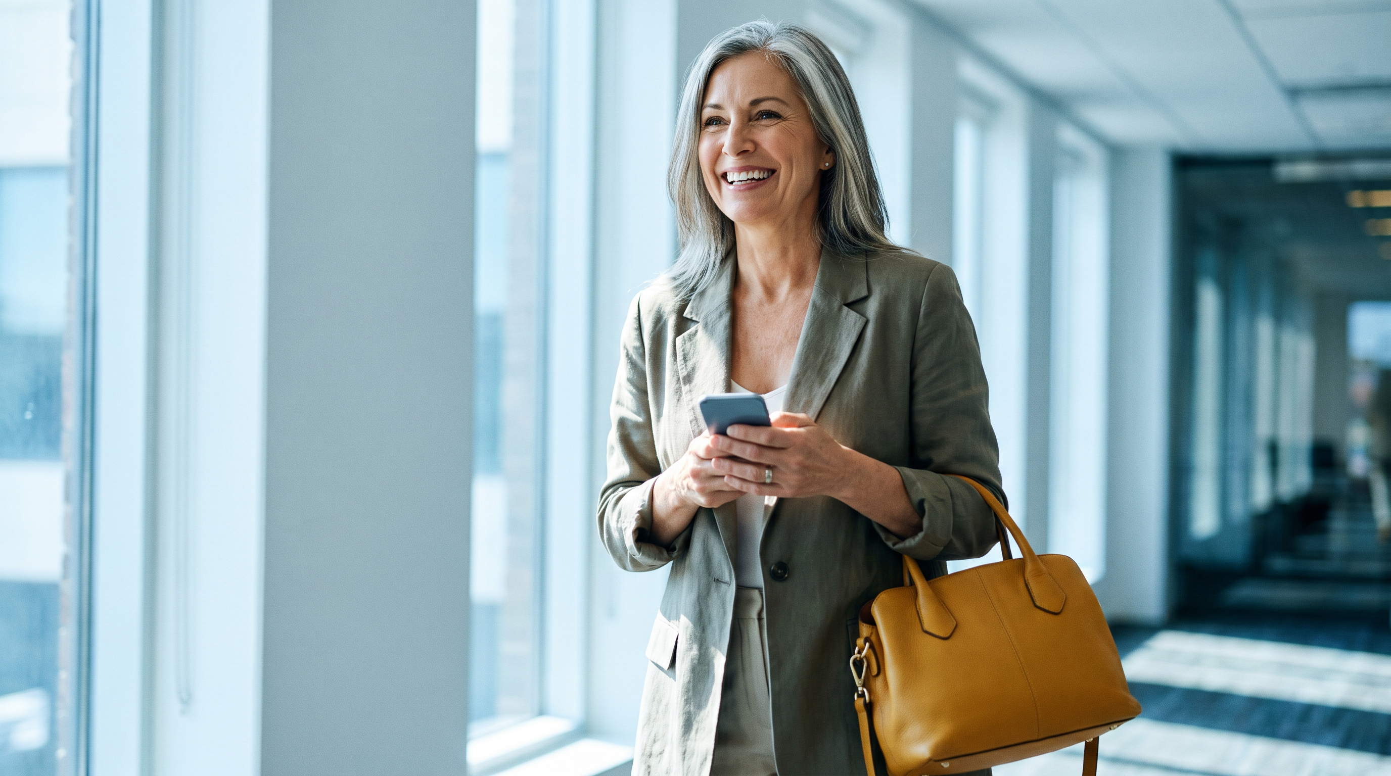 Confident woman leader walking through an office after choosing a network worth the Chief membership cost
