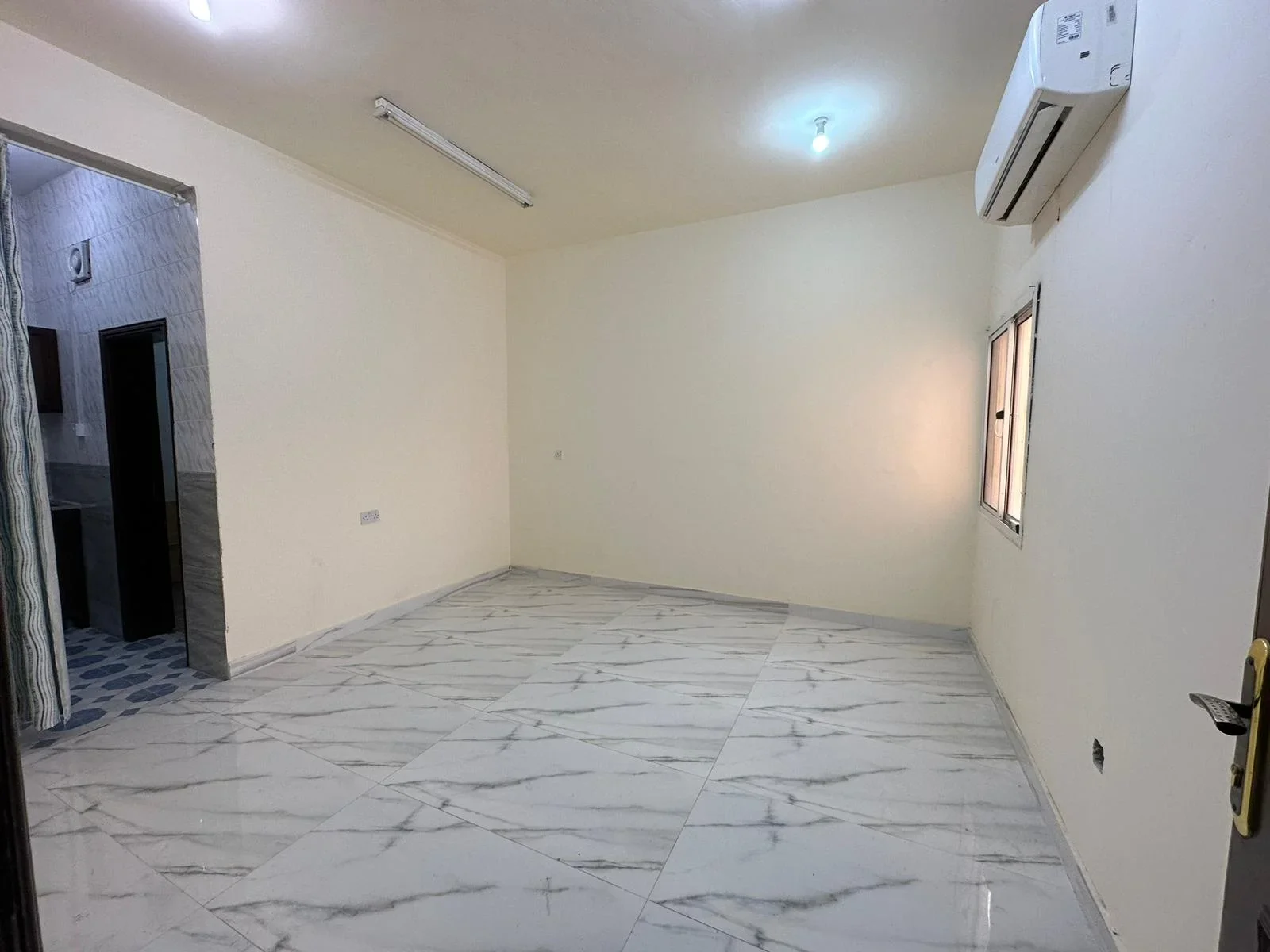 Cozy 1-Bedroom Apartment for Rent in Al Kharaitiyat | Split A/C Included - view 3