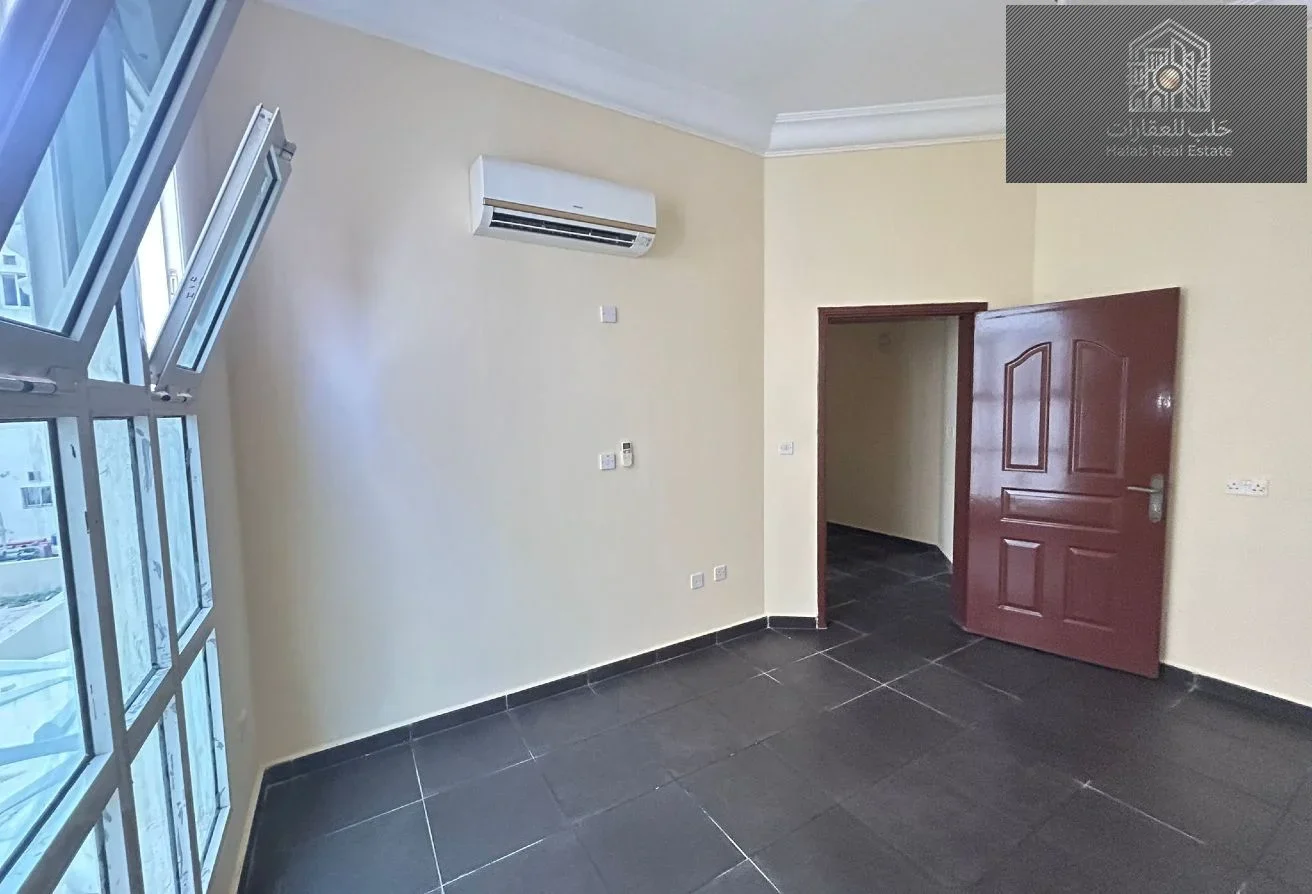 2-Bedroom Apartment for Rent in Madinat Khalifa | Unfurnished + Central A/C