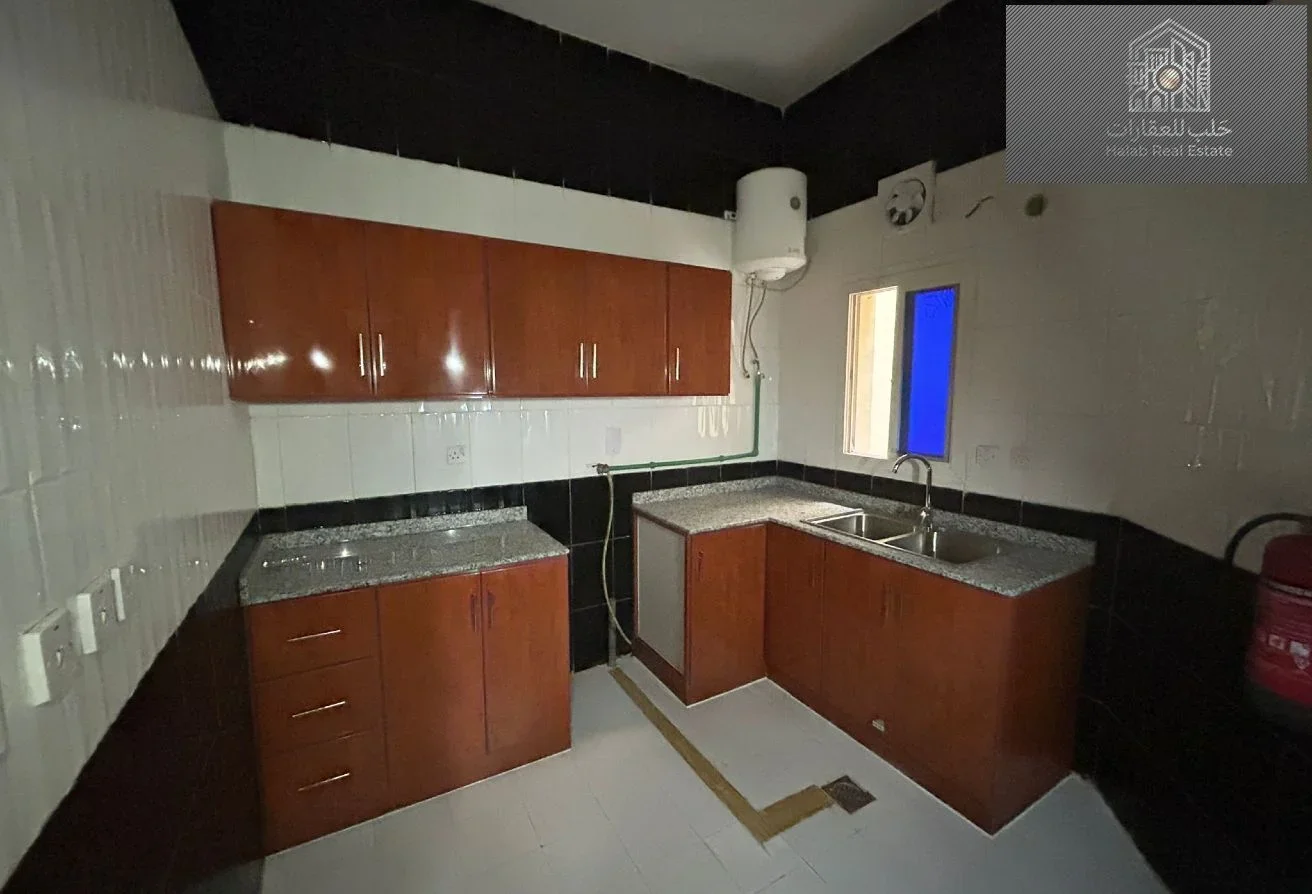 2-Bedroom Apartment for Rent in Madinat Khalifa | Unfurnished + Central A/C