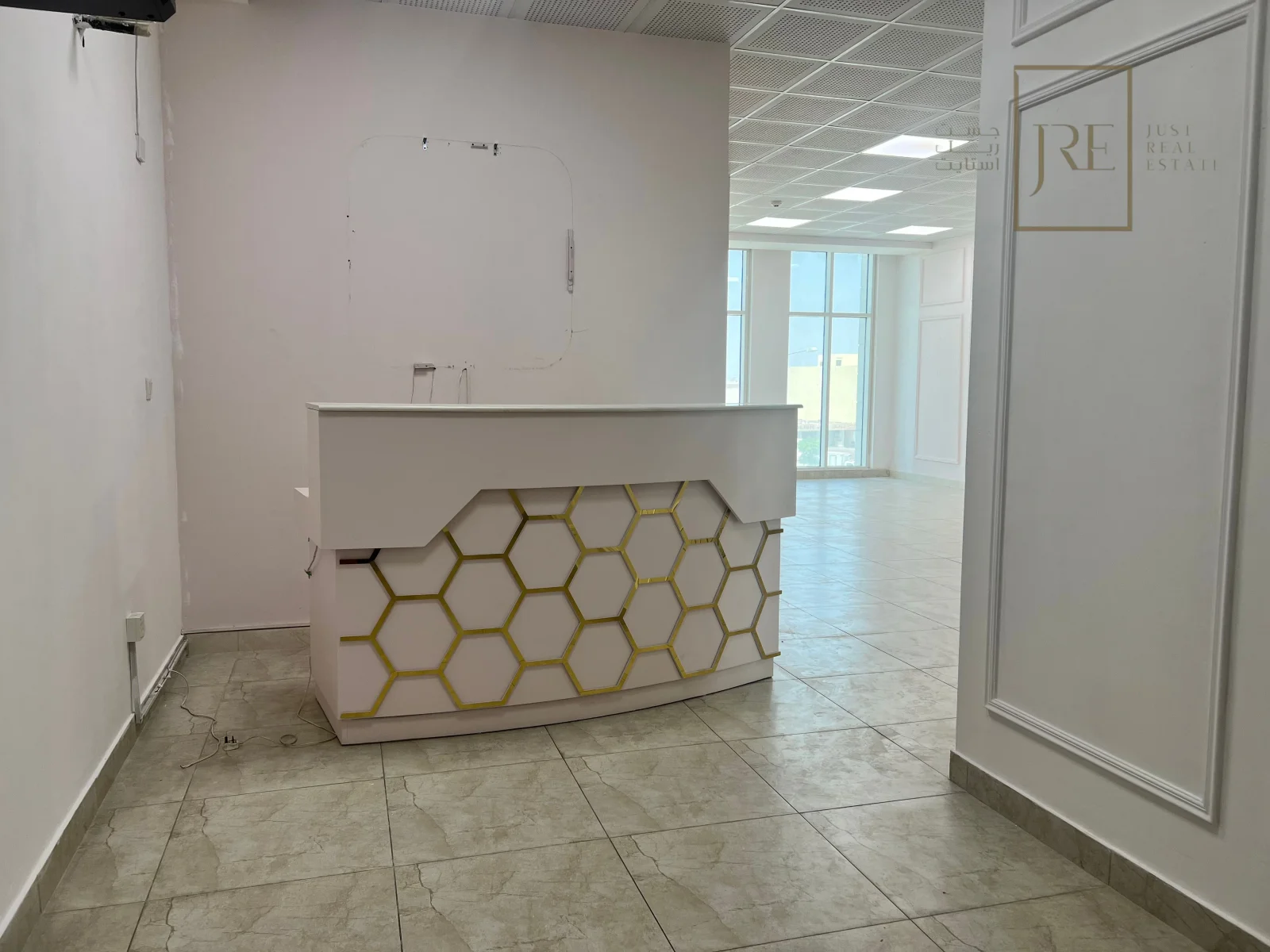 Semi-Fitted Shop Space for Rent in Al Mamoura Plaza | Prime Location + Parking