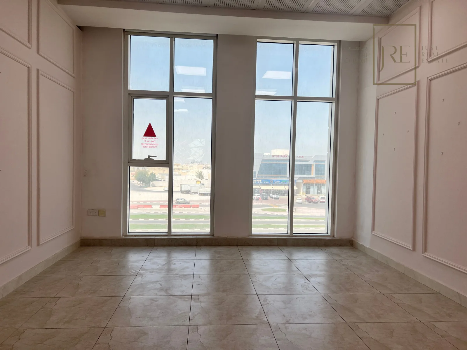 Semi-Fitted Shop Space for Rent in Al Mamoura Plaza | Prime Location + Parking