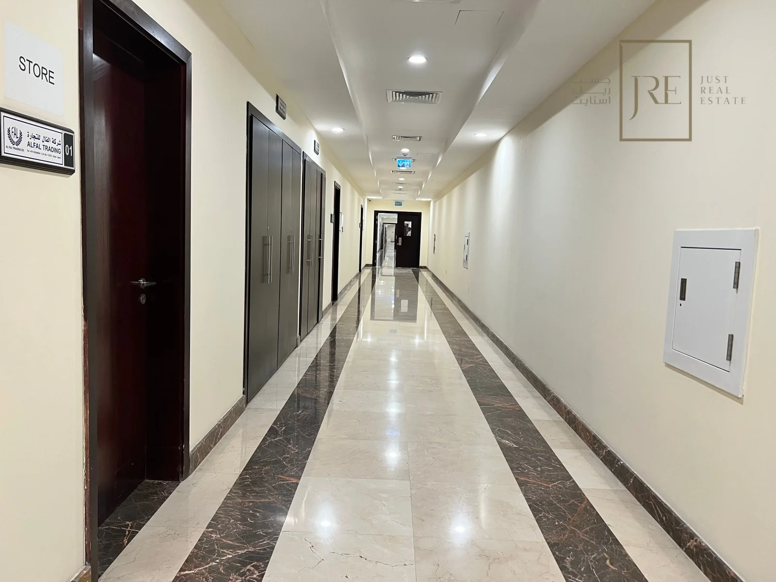 Semi-Fitted Shop Space for Rent in Al Mamoura Plaza | Prime Location + Parking
