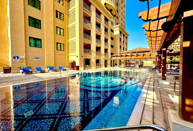 INCLUDING KAHRAMAA | STUDIO APARTMENT WITH BALCONY