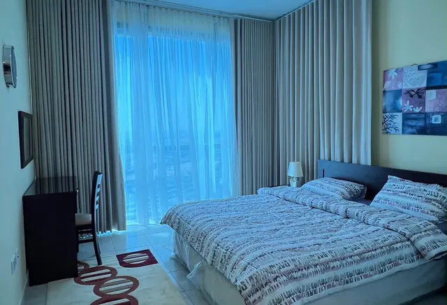 COZY 2 BR PLUS MAID IN ZIG ZAG WITH SEA VIEW