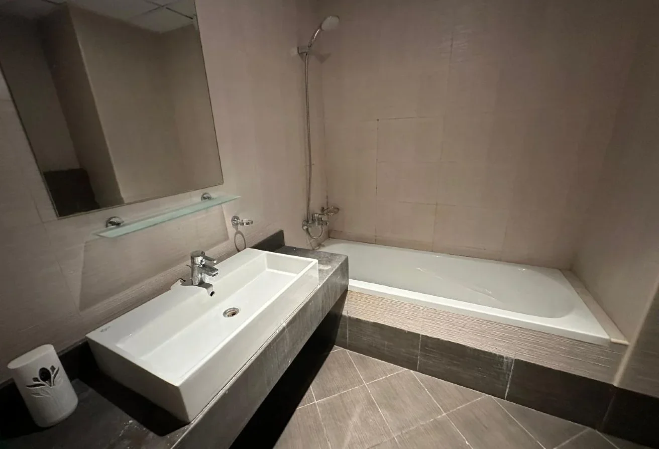 Semi-Furnished 2BHK • Massive Terrace Feature