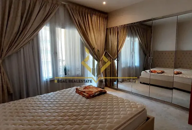 Furnished 2-BR Apartment with Balcony