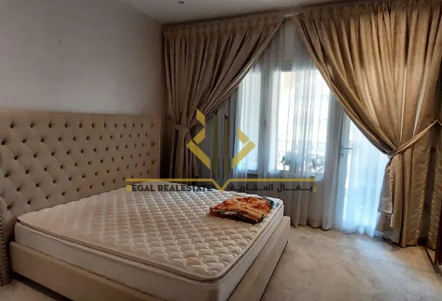 Furnished 2-BR Apartment with Balcony