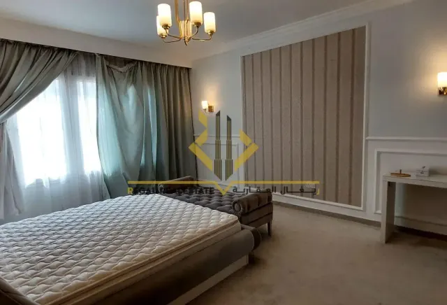 Furnished 2-BR Apartment with Balcony