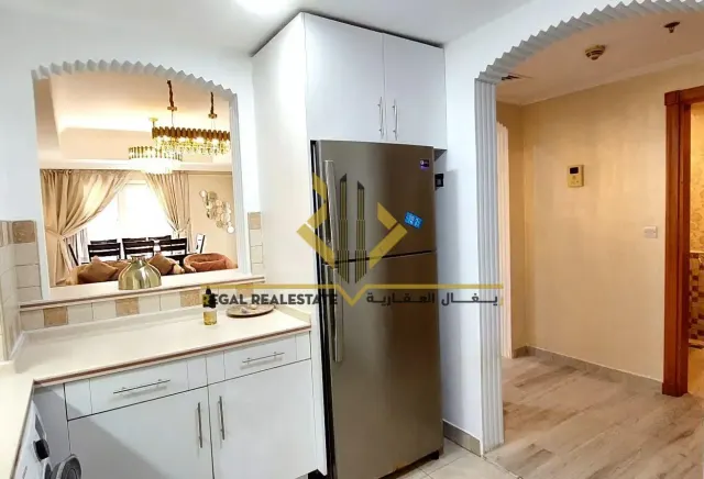 Furnished 2-BR Apartment with Balcony