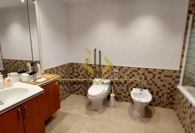Furnished 2-BR Apartment with Balcony