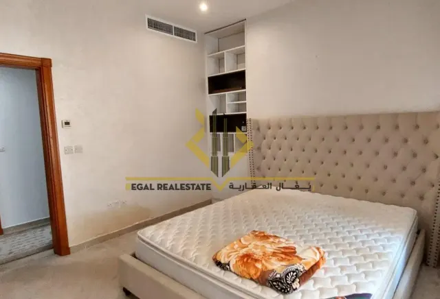 Furnished 2-BR Apartment with Balcony