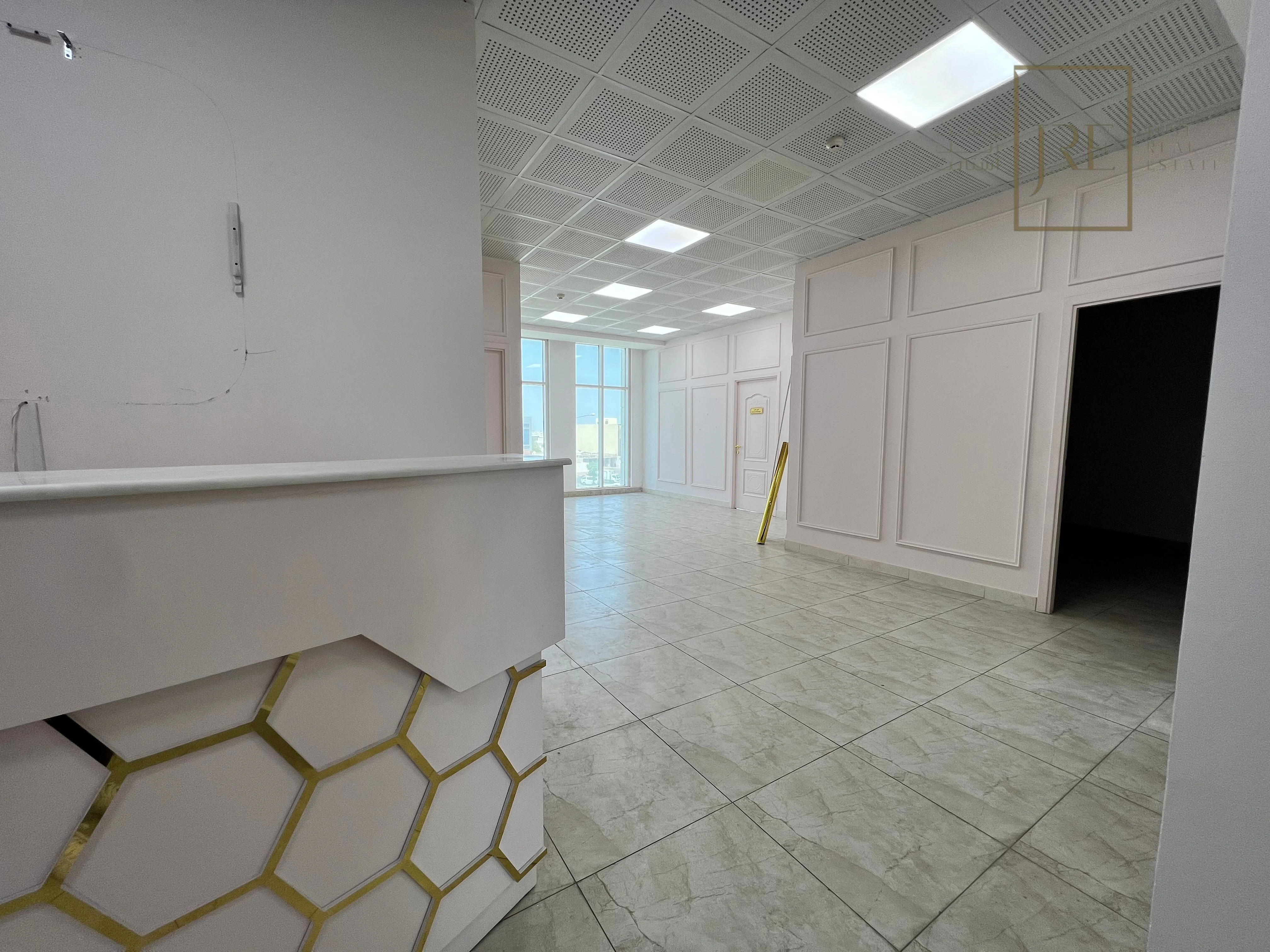 Semi-Fitted Shop Space for Rent in Al Mamoura Plaza | Prime Location + Parking