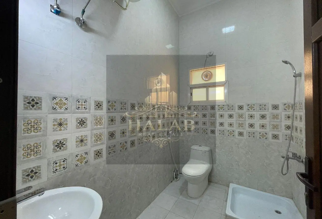 Villas for sale in a compound in Umm Al Amad, near