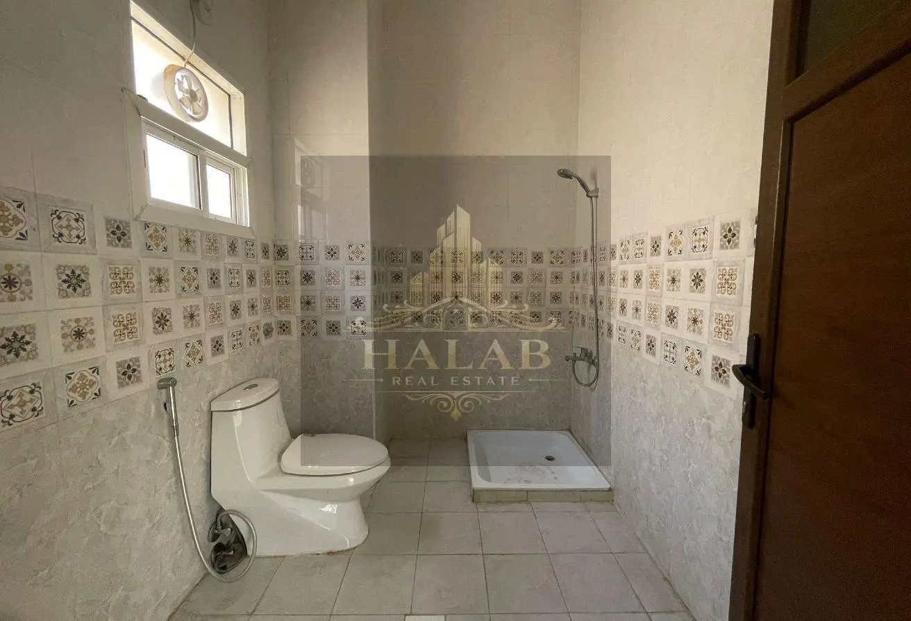 Villas for sale in a compound in Umm Al Amad, near