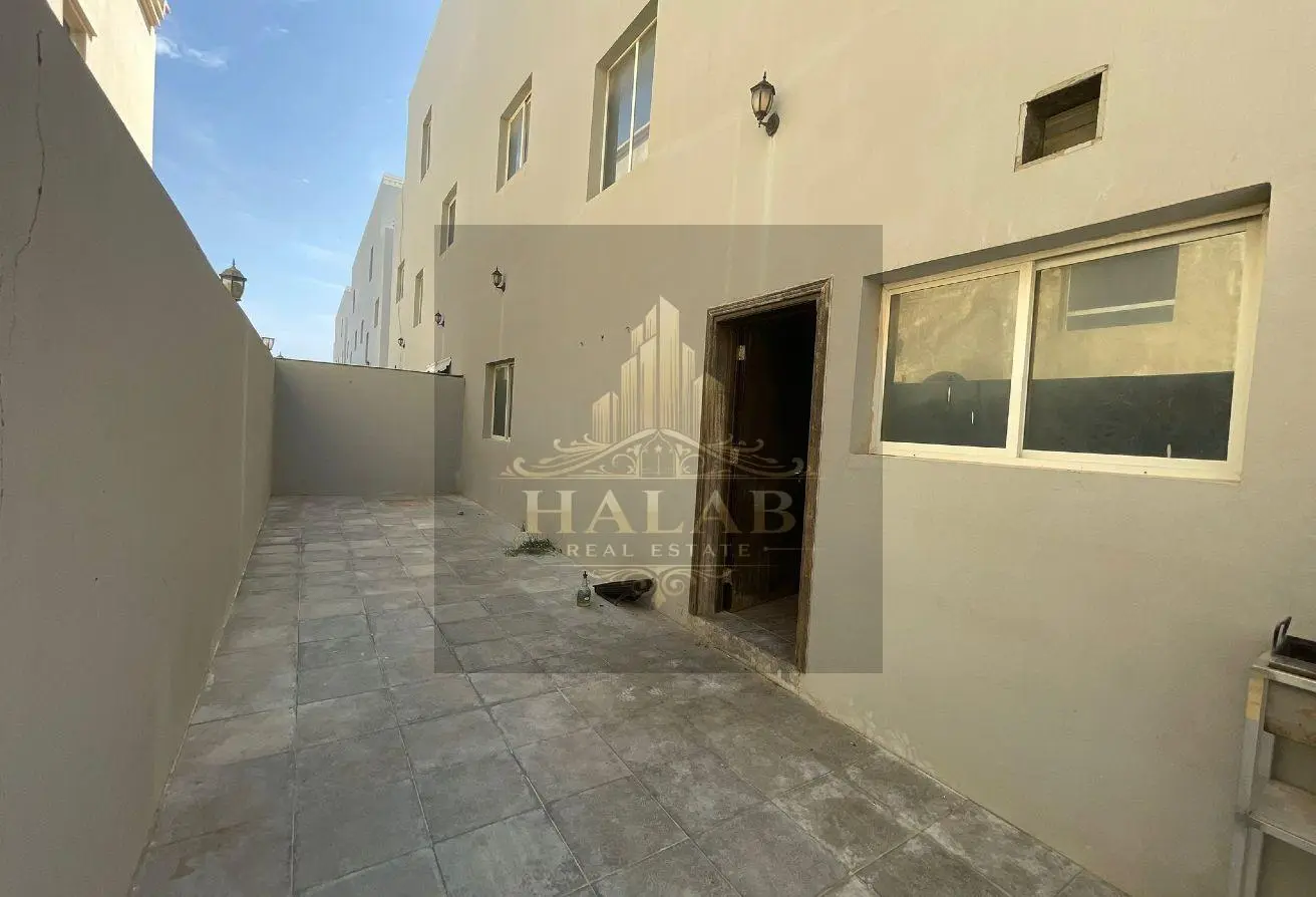 Villas for sale in a compound in Umm Al Amad, near
