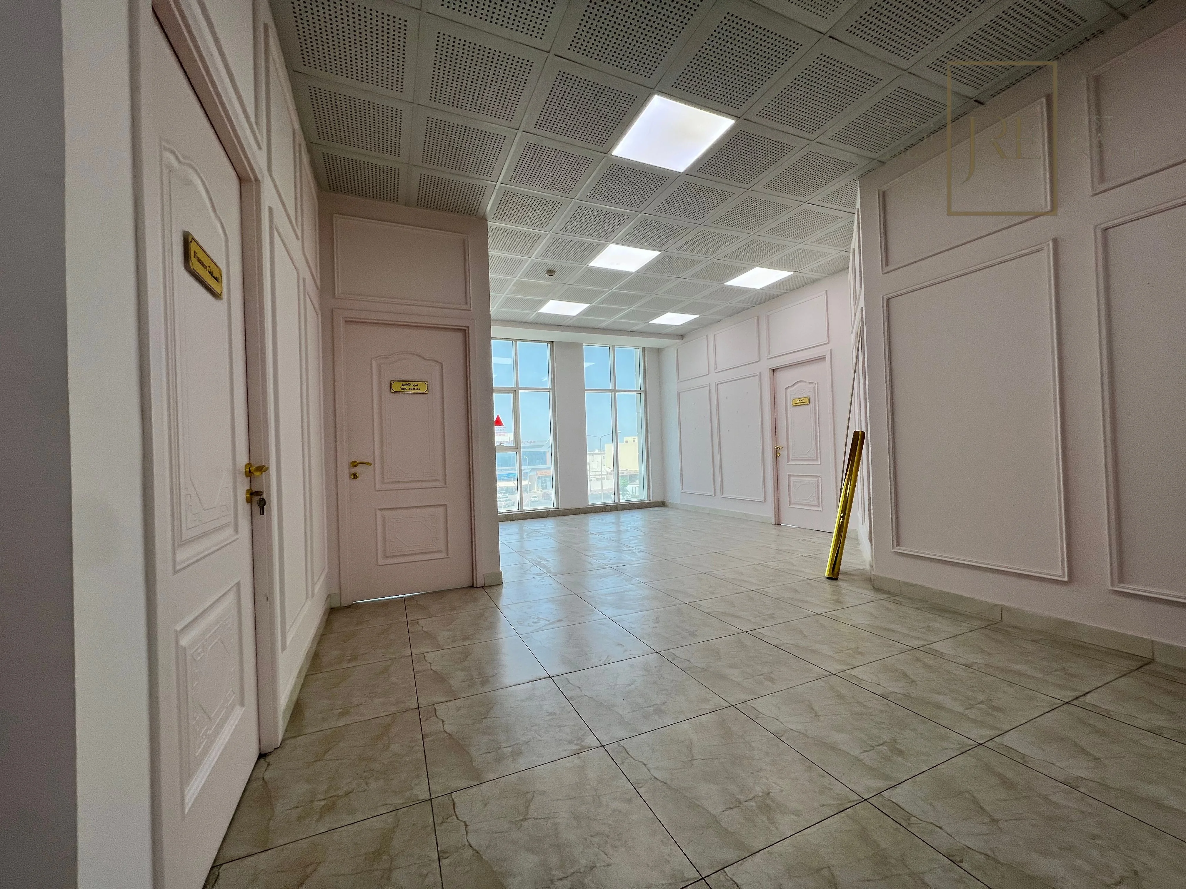 Semi-Fitted Shop Space for Rent in Al Mamoura Plaza | Prime Location + Parking