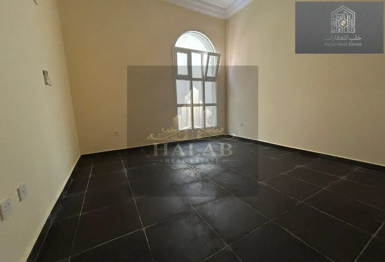 Well-located 2 bedroom unfurnished apartment in Madinat Khalifa Building 58