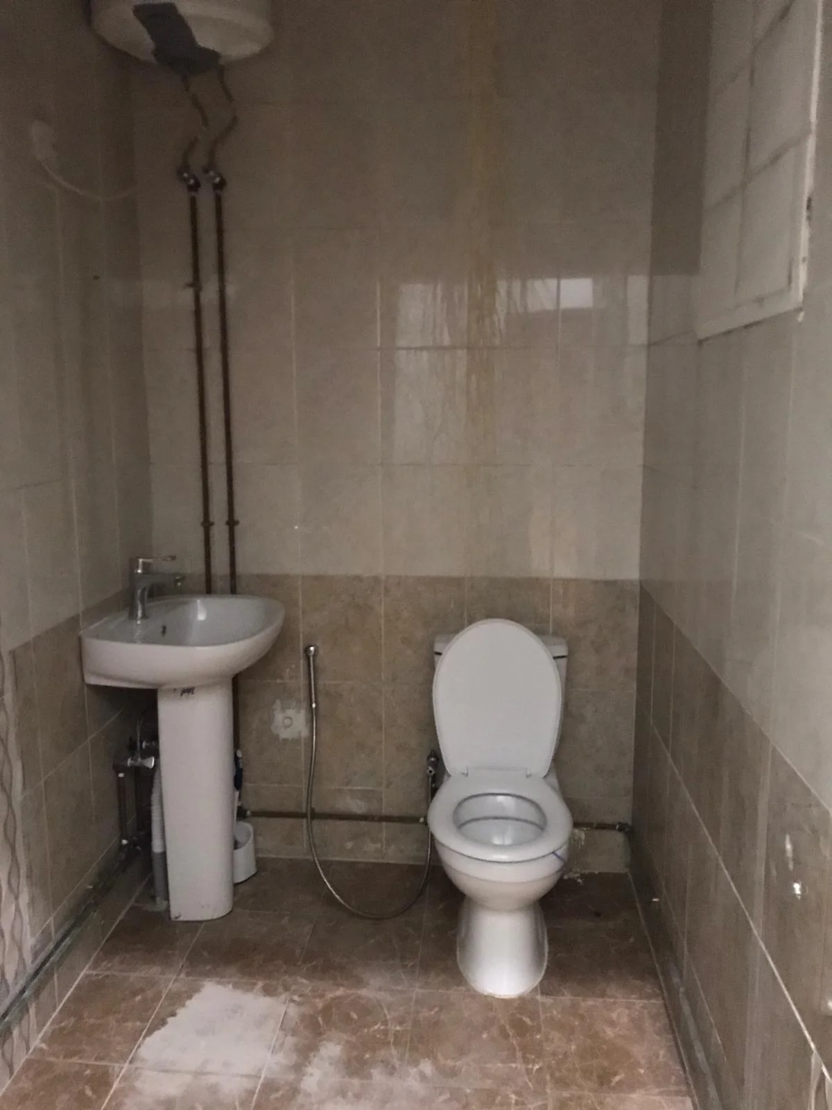 A large room and hall (two rooms, including a corridor), bathroom and comprehensive kitchen with split air conditioner, Al Kharaitiyat, 9-storey villa, ground floor inside the villa, 3300