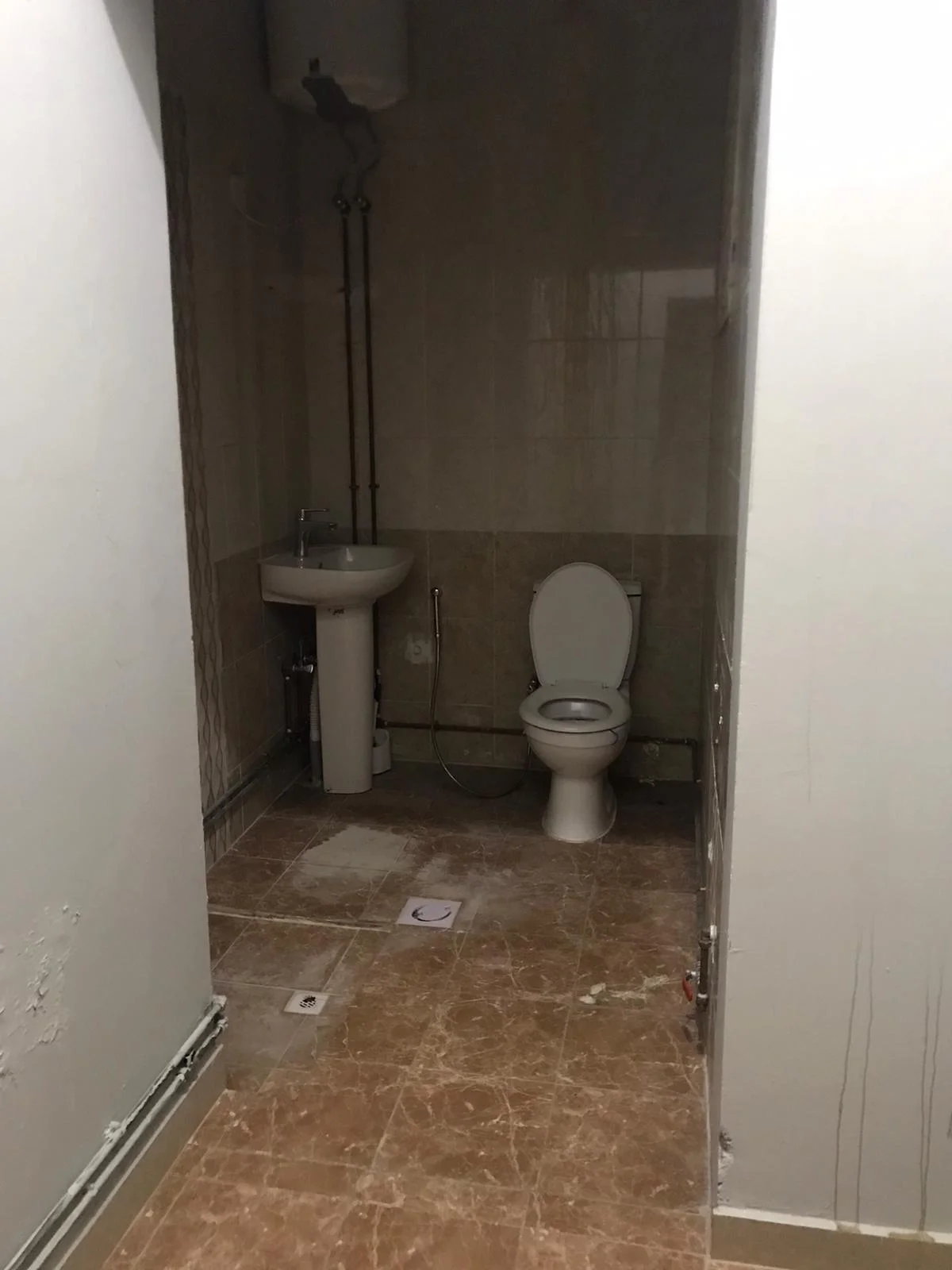 A large room and hall (two rooms, including a corridor), bathroom and comprehensive kitchen with split air conditioner, Al Kharaitiyat, 9-storey villa, ground floor inside the villa, 3300