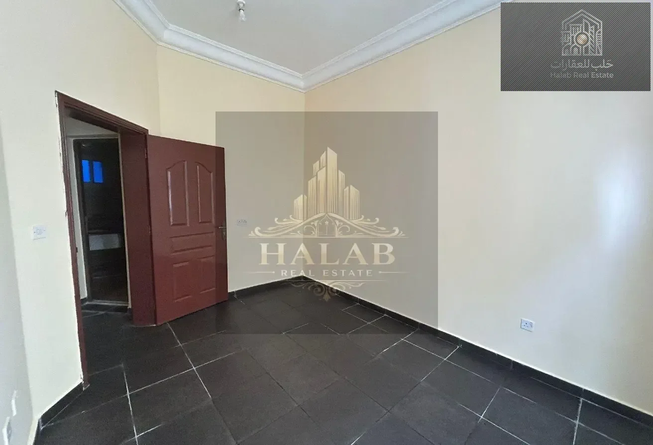 Well-located 2 bedroom unfurnished apartment in Madinat Khalifa Building 58