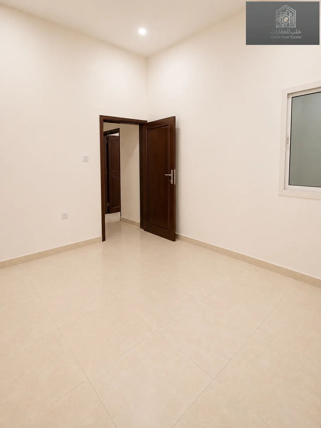 Family 2-Bedroom Apartment with Majlis in Madinat Khalifa Building 58
