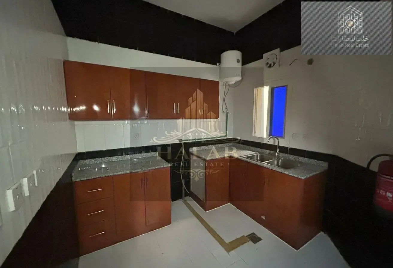 Well-located 2 bedroom unfurnished apartment in Madinat Khalifa Building 58