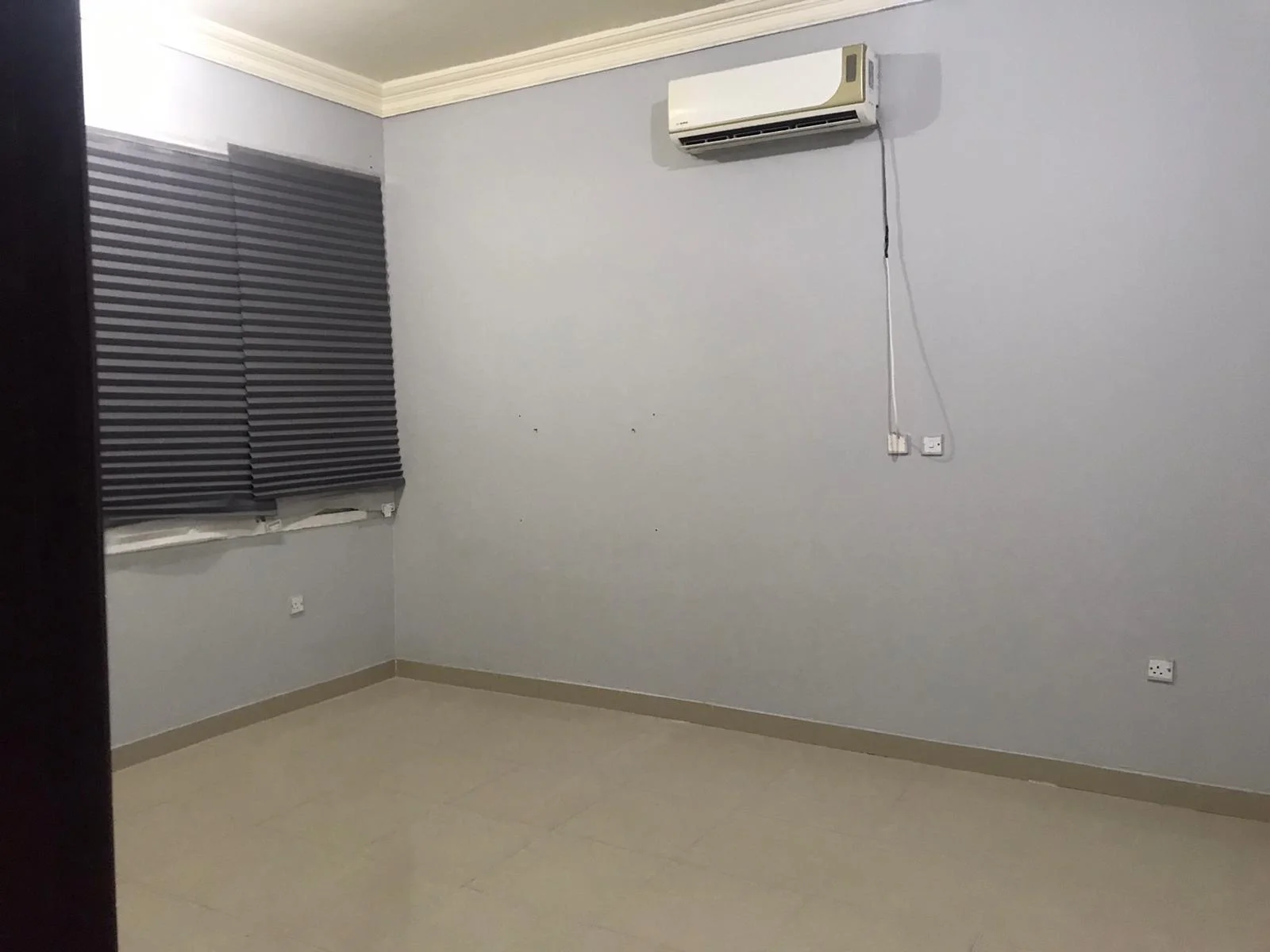 A large room and hall (two rooms, including a corridor), bathroom and comprehensive kitchen with split air conditioner, Al Kharaitiyat, 9-storey villa, ground floor inside the villa, 3300