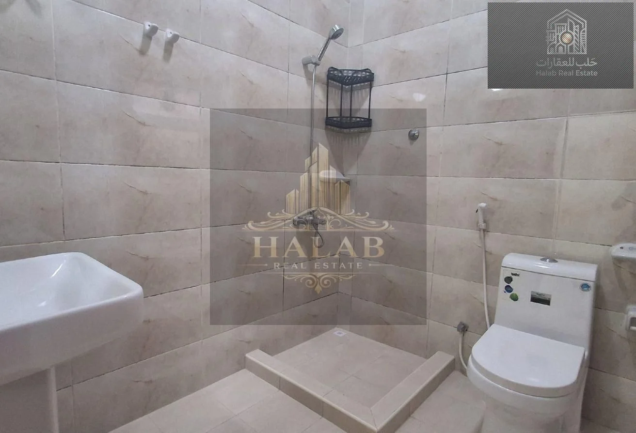 Family 2-Bedroom Apartment with Majlis in Madinat Khalifa Building 58