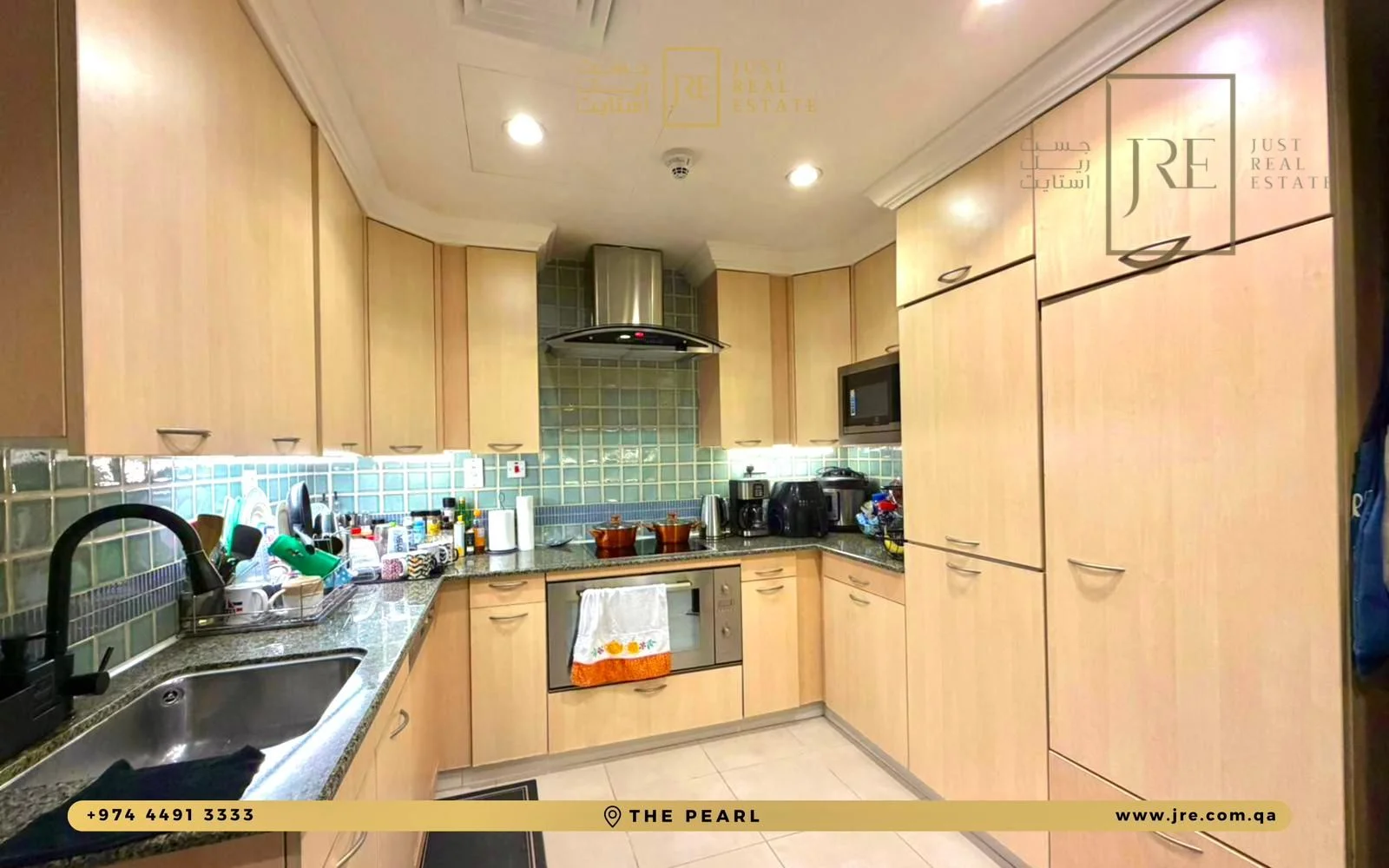 Spacious 4-Bedroom Apartment + Maid's Room in The Pearl | Semi-Furnished
