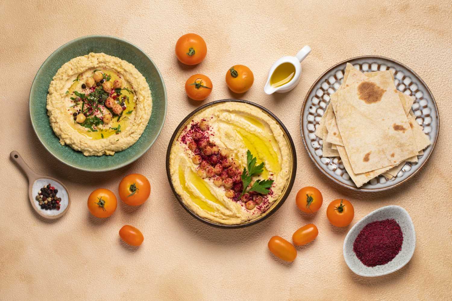 Flat lay of dishes using sesame seedsâ€”salads, tahini, baked goods.