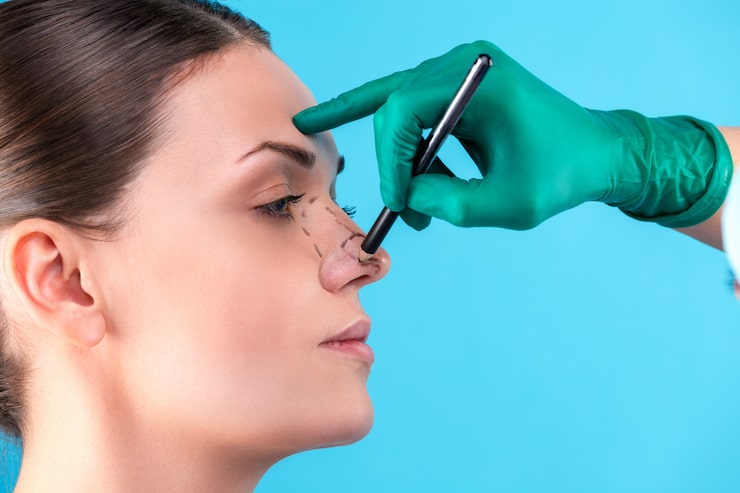 Woman receiving consultation for nose surgery