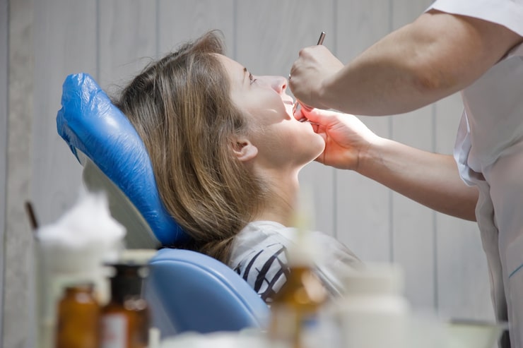 woman going through a procedure with a doctor