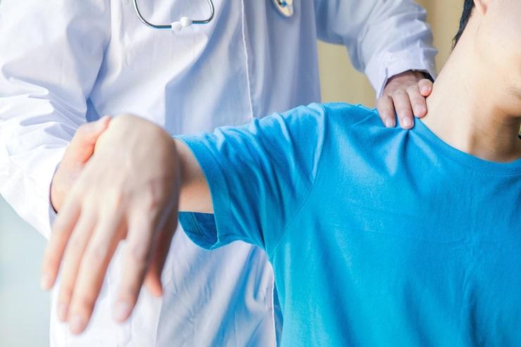 A doctor examining a patient pre-surgery