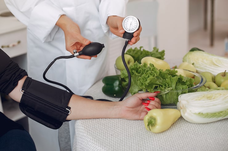 patient checking blood pressure