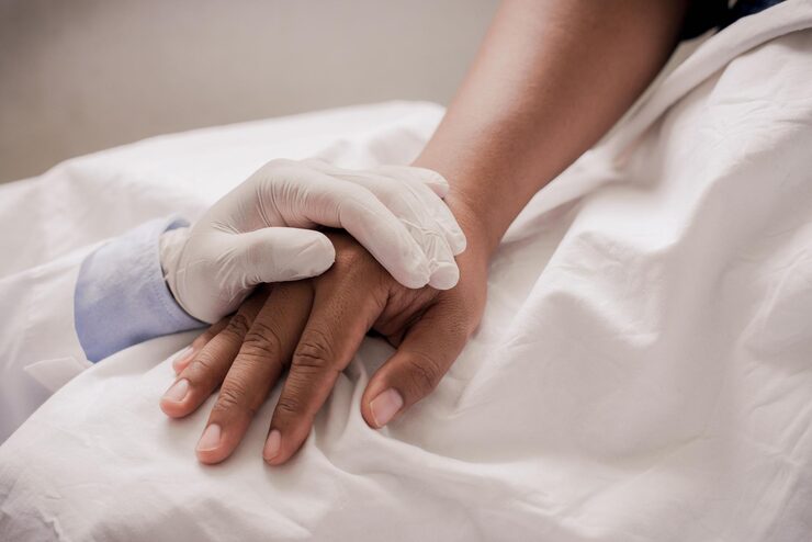 doctor reassuring patient with vitiligo