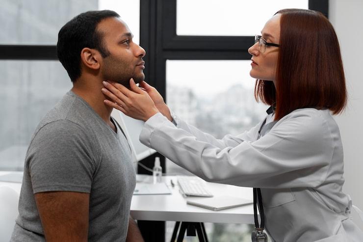 Doctor checking the patient for a followup