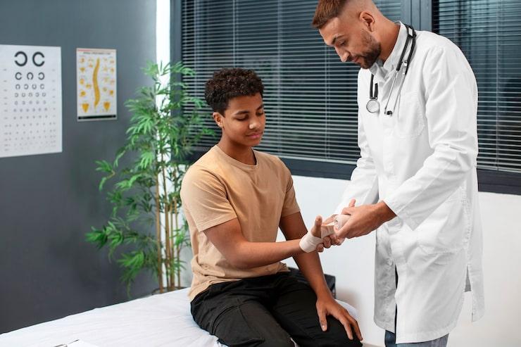 doctor with patient for post surgery check-up