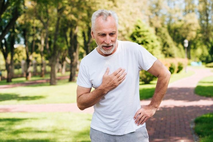 old man having a heart attack