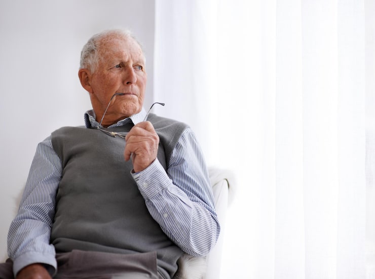 elderly man displaying signs of dementia