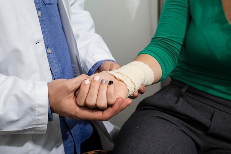 doctor treating person with avulsion fracture